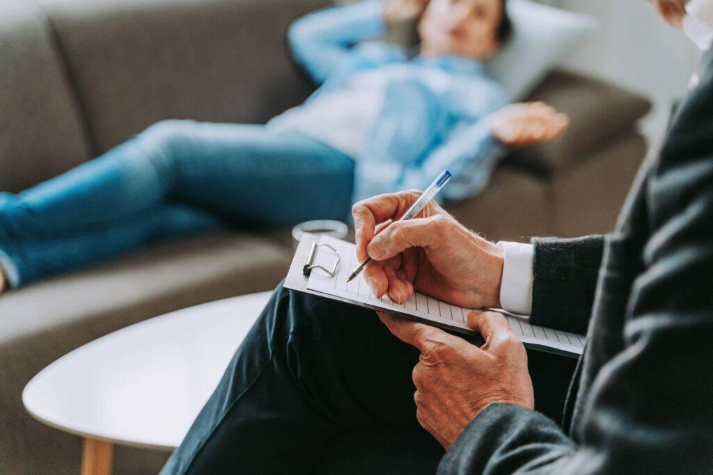 Woman having a session with psychiatric care provider.