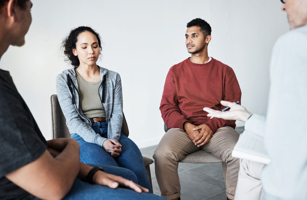 Support group doing a meeting.