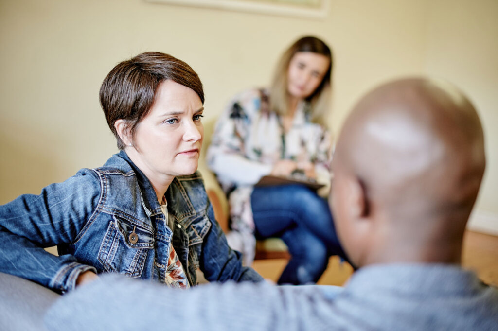 Therapist listening to couple.